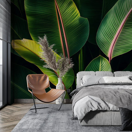 Tropical banana leaf wallpaper mural creating a stunning accent wall in modern living room with natural light