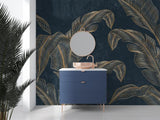Luxury master bedroom featuring gold banana leaf wallpaper with dramatic navy background and soft lighting