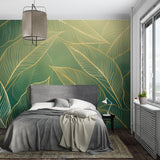 Tropical gold leaf wallpaper creating a luxurious atmosphere in a modern living room setting