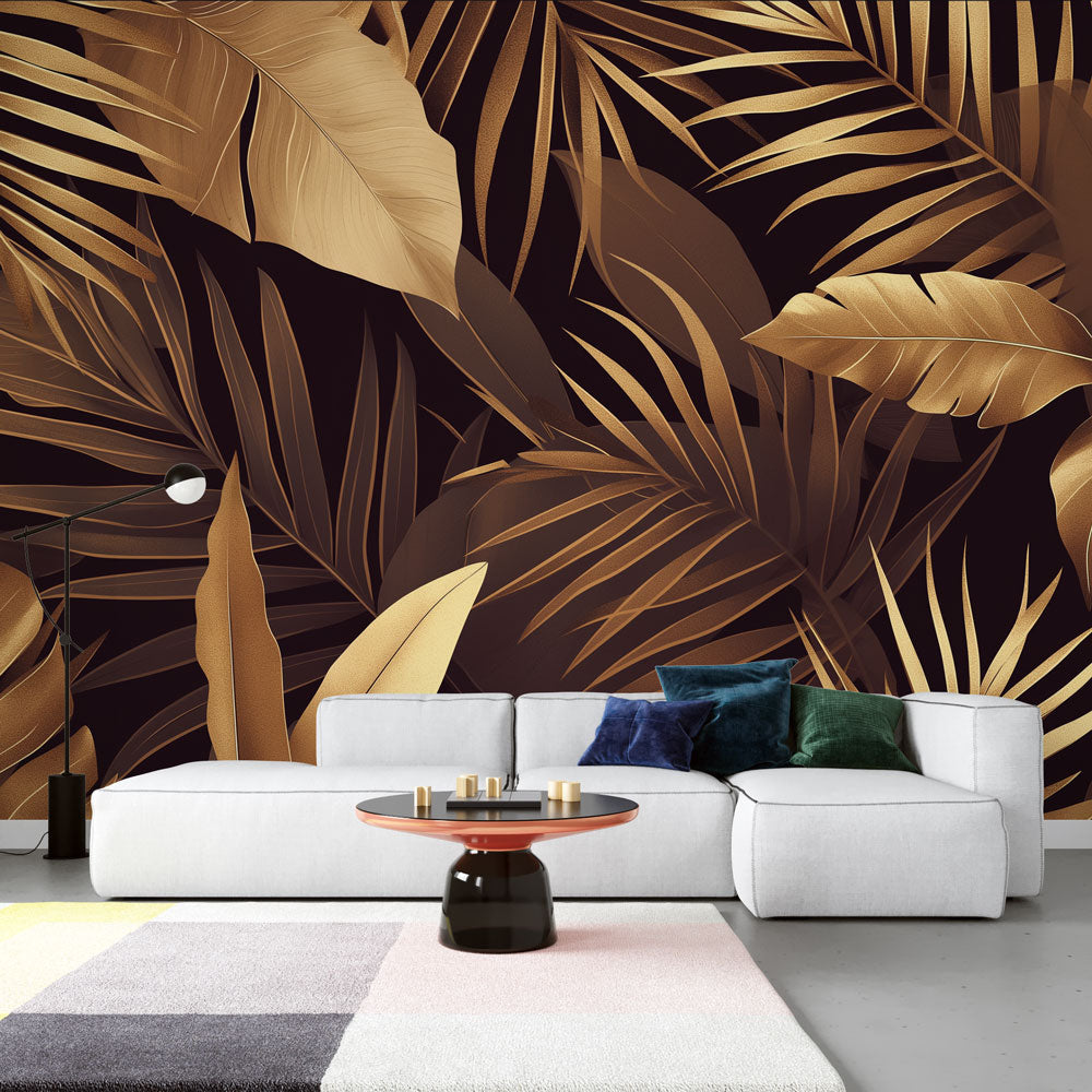 Tropical black and gold palm leaf wallpaper in modern dining room with dramatic lighting highlighting metallic details