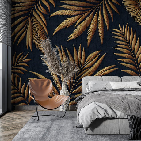 Tropical palm leaf wallpaper with gold details creating depth in a modern dining room with navy and gold accents