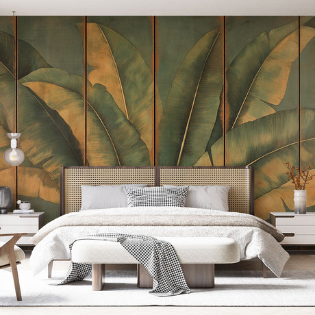 Tropical banana leaf wallpaper with golden accents creates a stunning backdrop in a modern living room with natural light