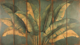 Large-scale golden banana leaves design file on emerald background showing intricate pattern details
