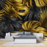 Master bedroom with golden tropical leaf wallpaper adding luxury to accent wall