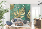 Golden Monstera leaves pattern on green marble background in entrance hall