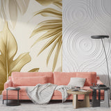 Golden monstera leaf mural adding luxury to a bright dining room space