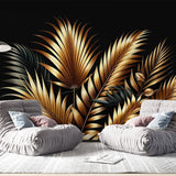 Black and gold palm leaf wallpaper creating a luxurious atmosphere in a modern dining room with ambient lighting