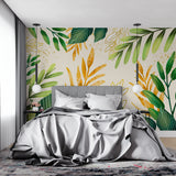 Green and gold botanical wallpaper bringing luxury to a master bedroom