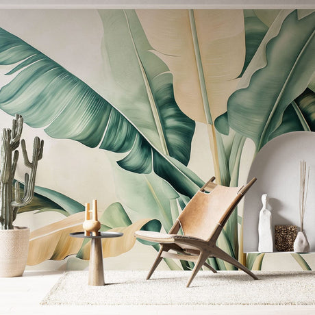 Tropical leaf wallpaper creating a stunning backdrop in a modern living room with natural light and minimal furniture