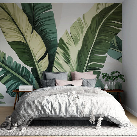 Tropical banana leaf wallpaper creating a stunning accent wall in a modern living room with natural light and minimal furniture