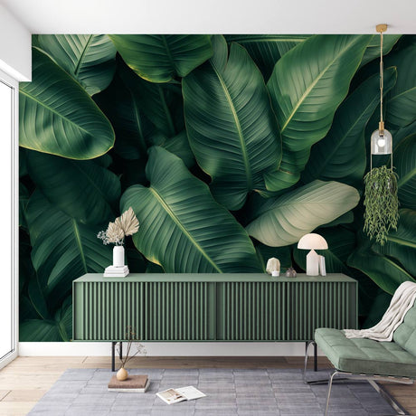 Tropical banana leaf wallpaper mural creating a fresh atmosphere in a modern living room with white furniture