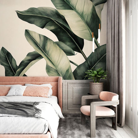 Tropical banana leaf wallpaper creating a bold statement in a modern living room with natural light and minimalist furniture