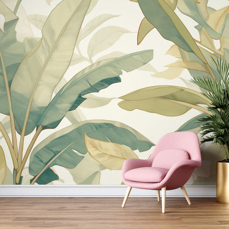 Tropical leaf wallpaper with gold accents creating a luxurious atmosphere in a modern living room