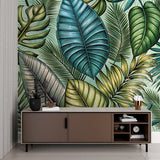 Botanical leaves mural in bright dining room setting with wooden furniture