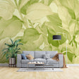Tropical foliage wallpaper creating a calm oasis in a modern living room with natural light