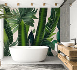 Large palm leaf wallpaper transforming a home office into a fresh workspace