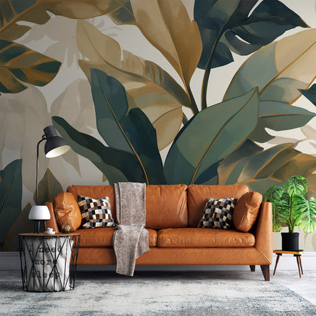 Tropical monstera leaf wallpaper creating a fresh atmosphere in a modern living room with golden accents