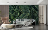 Green botanical wallpaper transforming a home office with fresh tropical vibes