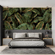 Tropical leaf wallpaper creating a stunning focal point in a modern living room with dark furniture