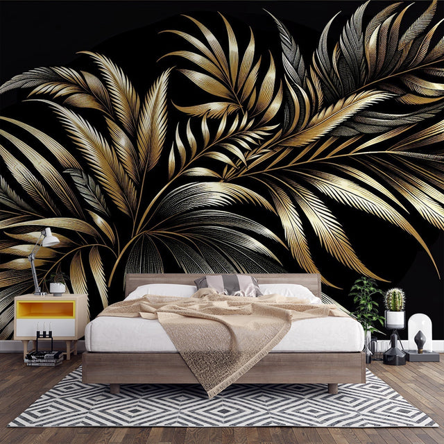 Black and gold palm leaf wallpaper creating dramatic impact in a modern living room with high ceilings and minimalist furniture