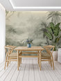 Tropical palm forest wallpaper in sage green creating a peaceful atmosphere in a modern living room
