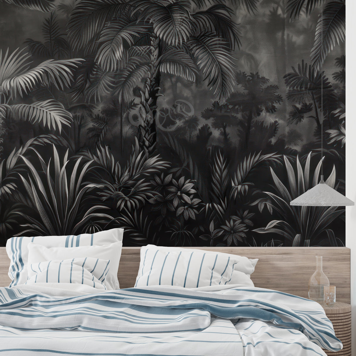 Home office space with sophisticated black and white palm leaf mural creating focus