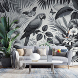 Monochrome tropical parrot wallpaper bringing elegant contrast to a modern living room with clean-lined furniture