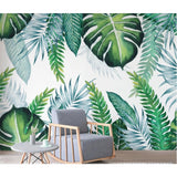 Tropical palm leaves mural in contemporary dining room space