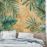 Tropical leaf wallpaper creating a stunning backdrop in a modern living room with natural light