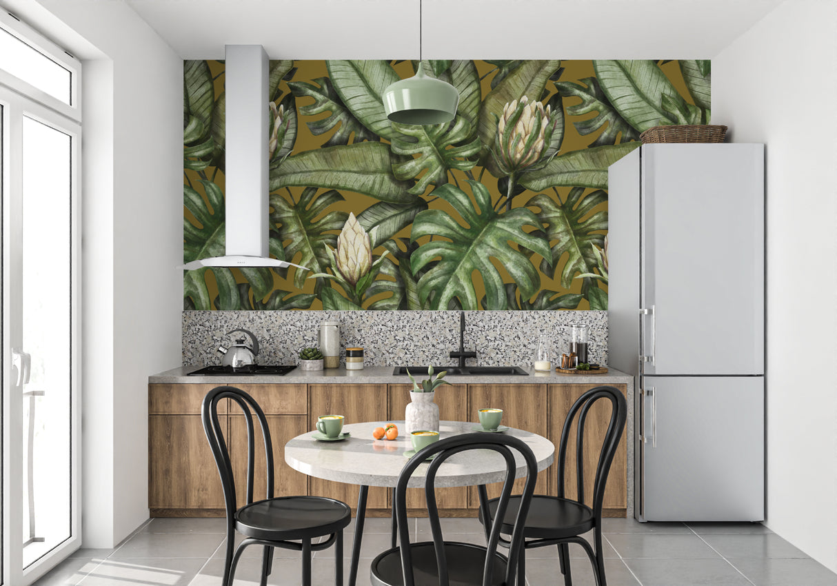 Monstera leaf mural in dining room showing scale and golden details