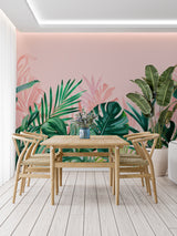 Pink and green Monstera wallpaper in stylish bedroom with white furniture