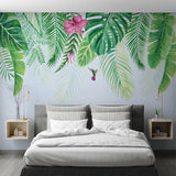 Monstera leaf wall mural with hummingbird adding natural charm to a home office setting