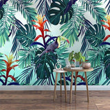 Tropical bird wallpaper with monstera leaves creating a stunning focal point in a modern living room
