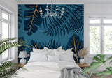 Home office space with botanical navy and gold wallpaper creating a sophisticated atmosphere