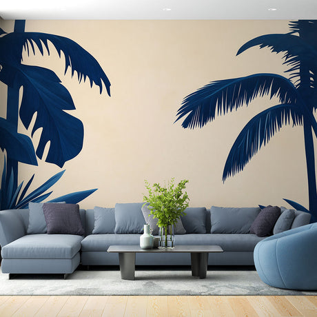 Tropical palm leaf wallpaper in modern living room, navy blue leaves on beige create depth and sophistication