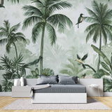 Birds and palm leaves mural adding depth to a home office space