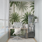 White and green palm leaf wallpaper transforming a dining room into an elegant tropical space
