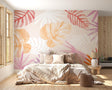 Tropical leaf wallpaper creating a serene atmosphere in a modern living room with natural light