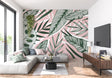 Tropical palm leaf wallpaper bringing fresh energy to a modern living room with pink and green tones