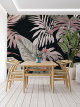 Botanical wallpaper with pink Monstera leaves making a statement in a dining room