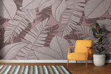 Banana leaf wallpaper bringing tropical charm to home office space with pink accents