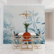Tropical palm leaf wallpaper in modern living room showing soft blue botanical pattern creating peaceful atmosphere