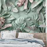 Dining room showcasing tropical leaf wallpaper in soft green and pink shades