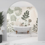 Botanical leaf wallpaper creating a calm atmosphere in a modern living room with natural light