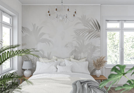 Tropical palm leaf wallpaper in modern living room showing soft beige and grey tones