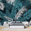 Tropical palm leaf wallpaper in modern living room showing teal and white leaves against dark background