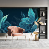 Teal jungle leaves mural creating focal point in minimalist bedroom setting