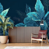 Tropical wallpaper featuring large teal leaves in stylish home office