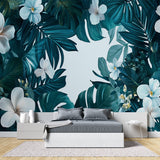 Tropical Monstera Leaf Wallpaper creating a stunning backdrop in a modern living room with natural light