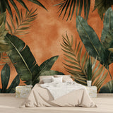 Botanical wall mural enhancing bedroom with soft terracotta tones